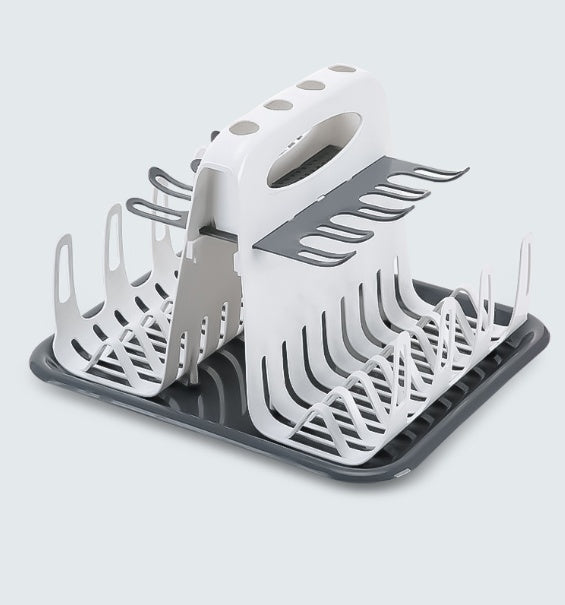 Foldable dish drying rack with white uprights and dark drip tray, side view