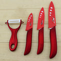 Red ceramic fruit knife set with peeler and four floral printed ceramic blades