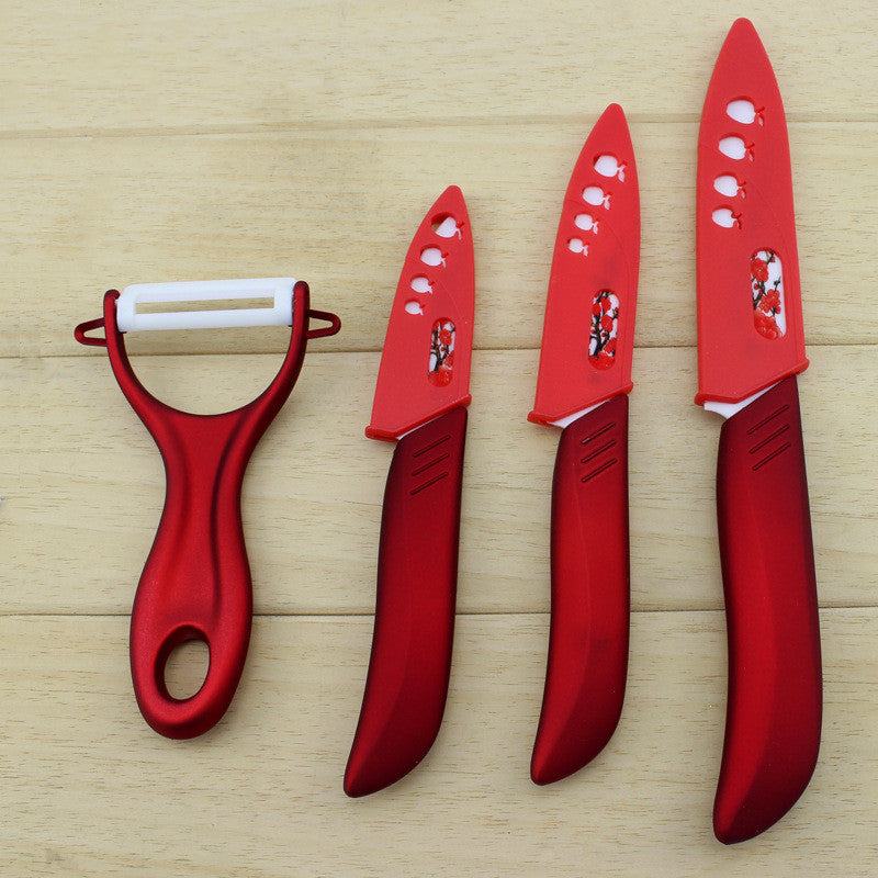 Red ceramic fruit knife set with peeler and four floral printed ceramic blades