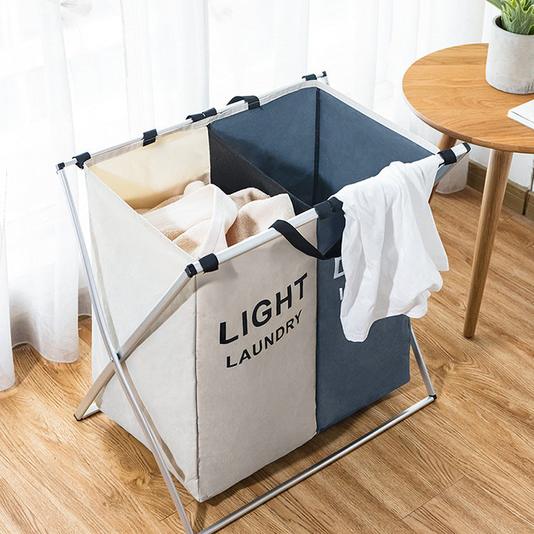 Three-compartment collapsible laundry hamper with handles, light and dark fabric panels, metal frame