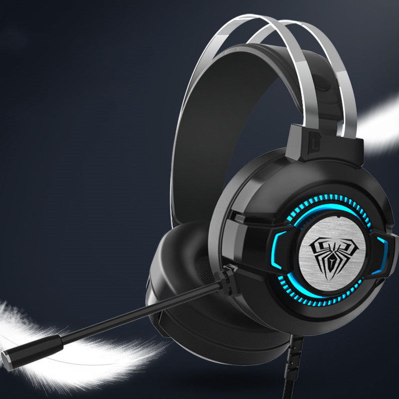 Black gaming headset with blue RGB earcup rings and extended boom microphone