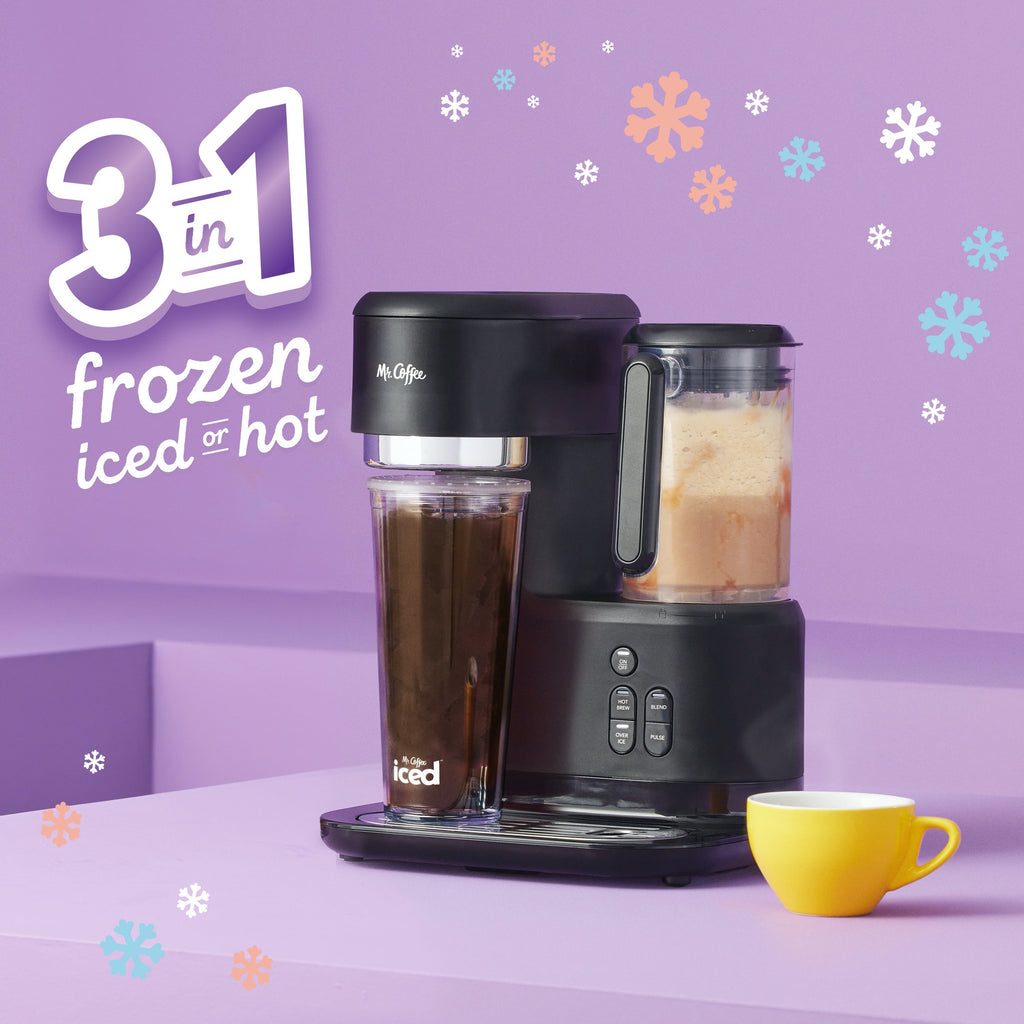 Black coffee maker with built-in blender and two clear cups for hot or iced drinks