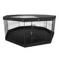 Black metal dog playpen with top cover, front latch, and enclosed wire panels