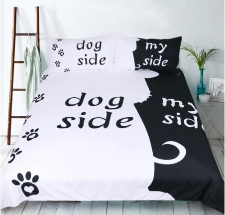 3-piece bedding set: white dog-side duvet with paw-print border, black my-side pillowcases