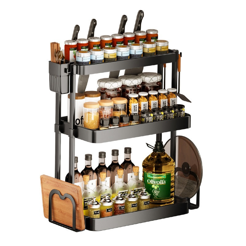 Black multi-layer kitchen storage rack with chopstick holder, hooks, and jar and bottle shelves