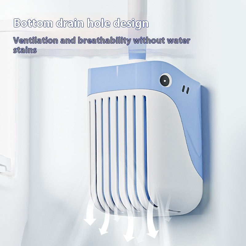 Blue toilet brush holder with vertical slots and a whale-shaped back panel