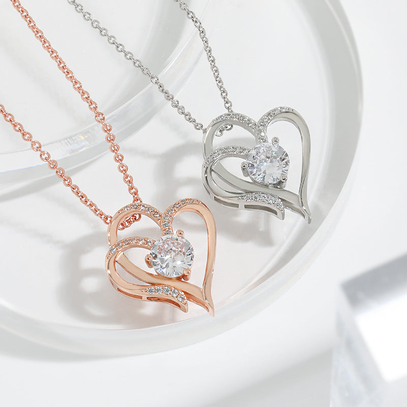 Rose gold and white gold double heart pendant necklaces with clear round stones