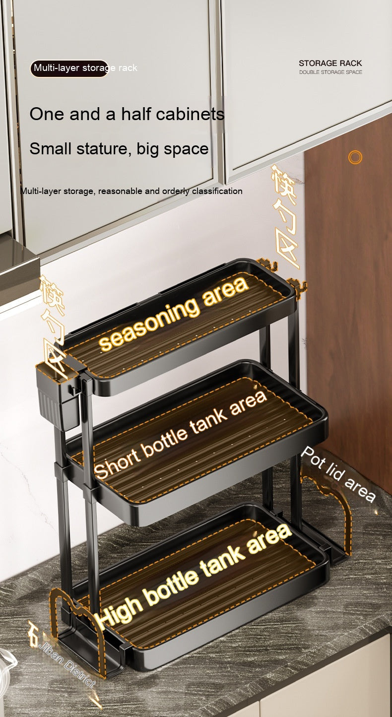 Black tiered kitchen storage rack with three shelves for bottles, pot lids, and seasoning jars