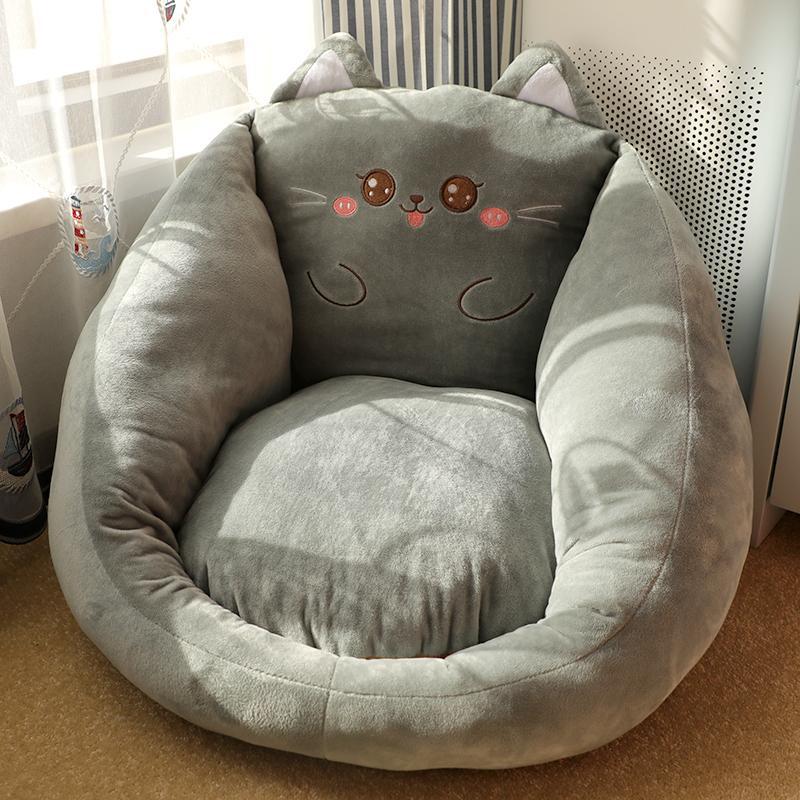 Round character floor cushion seat pad in gray with cute cat face and embroidered eyes.