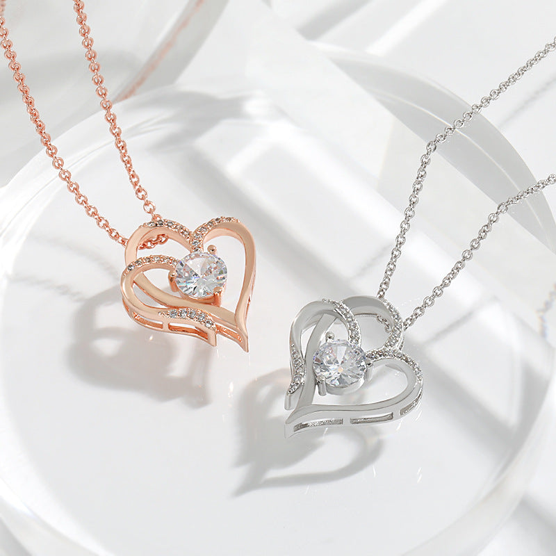 Rose gold and white gold double heart pendant necklaces with clear stones