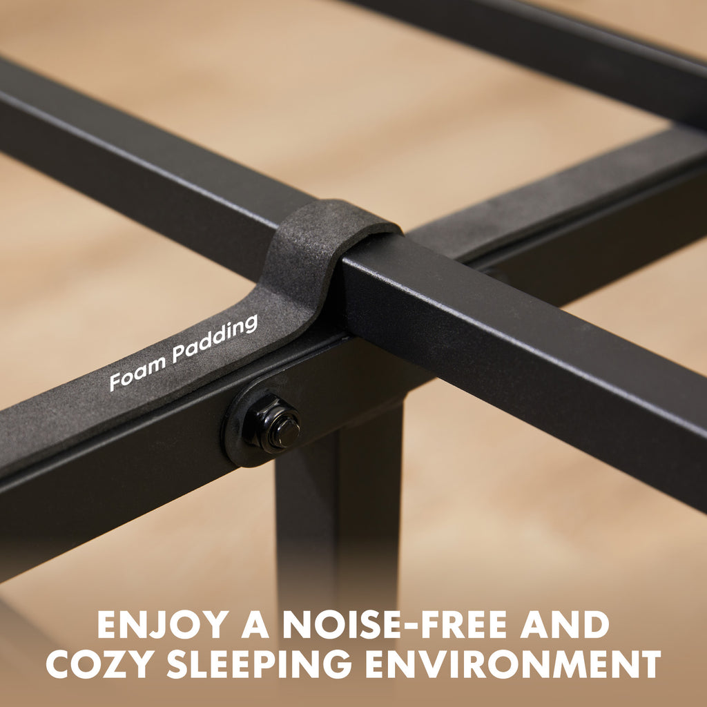 Black metal bed frame corner with foam padding on slat support