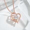 Rose gold double heart necklace with clear round center stone and pavé detail