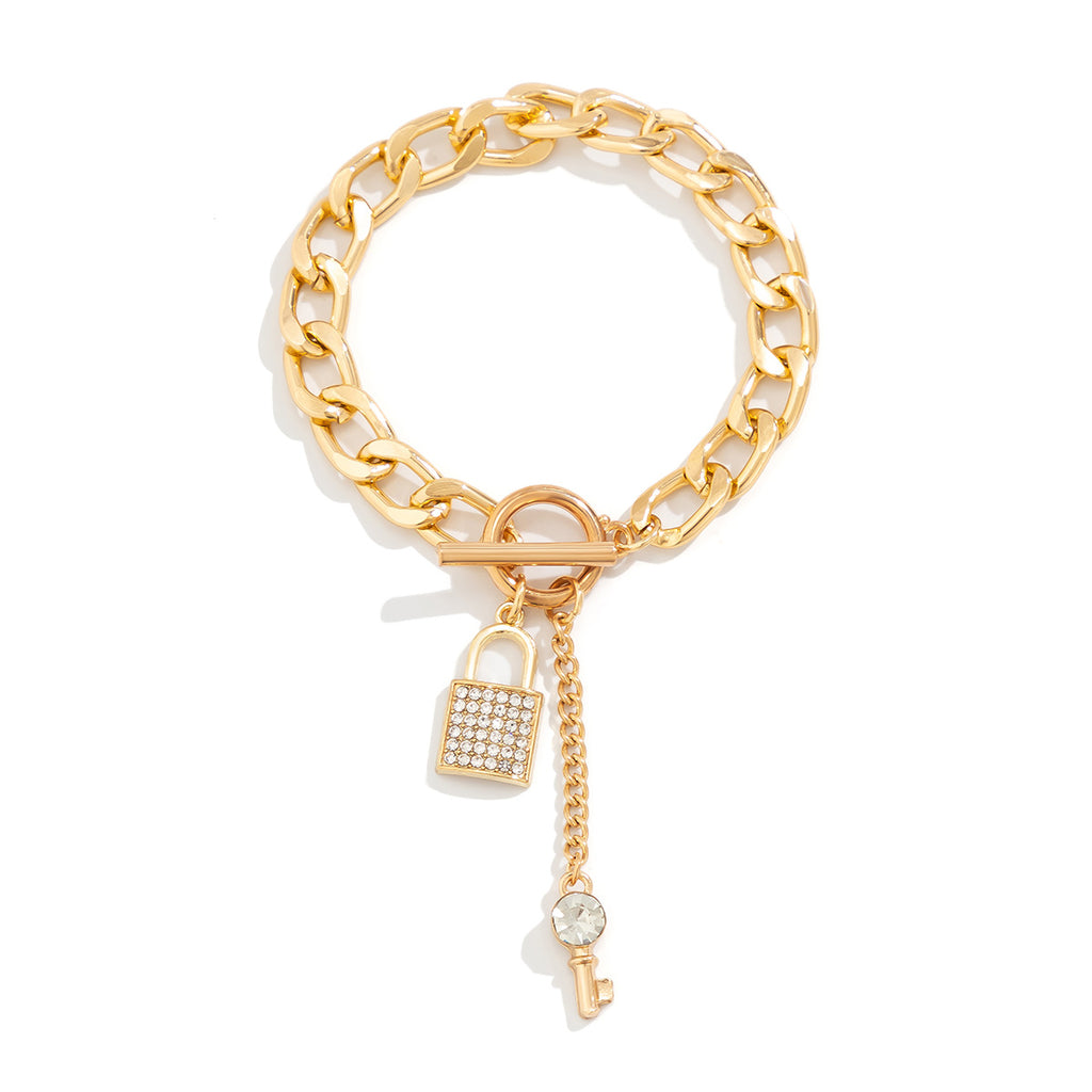 Gold chain bracelet with padlock and key dangle charm