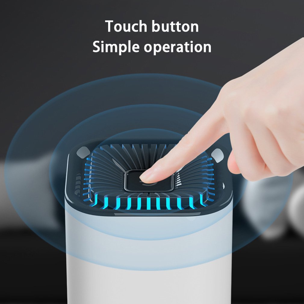 White portable air purifier top grille with blue-lit airflow ring, finger-touch control.