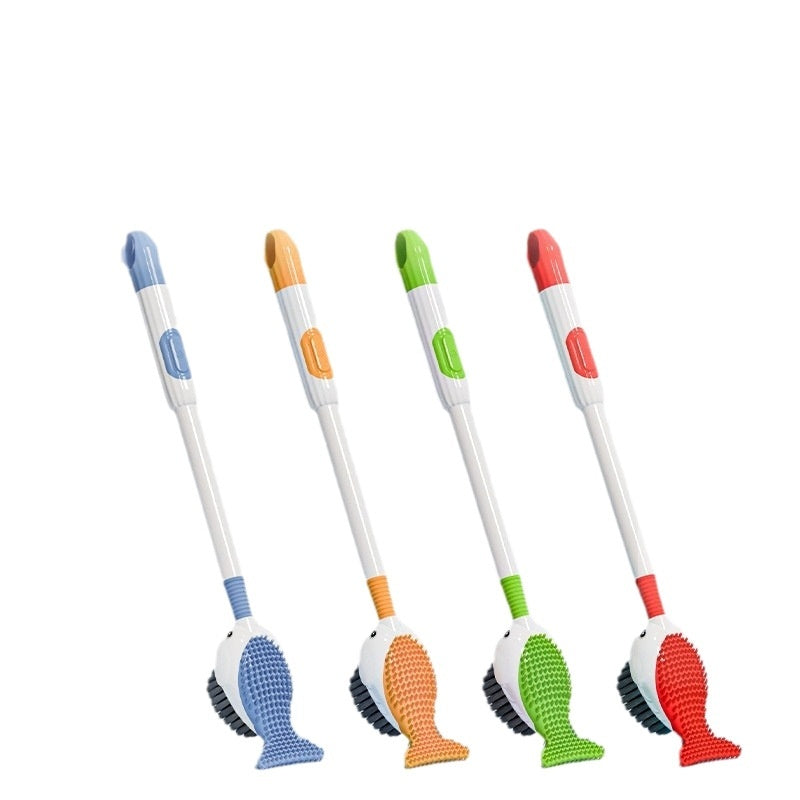 Toilet brush set with blue, orange, green, and red whale heads on white handles