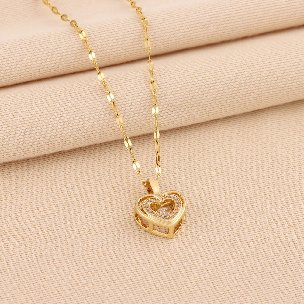 Gold-tone double-layer heart pendant necklace with rhinestone love-heart centerpiece
