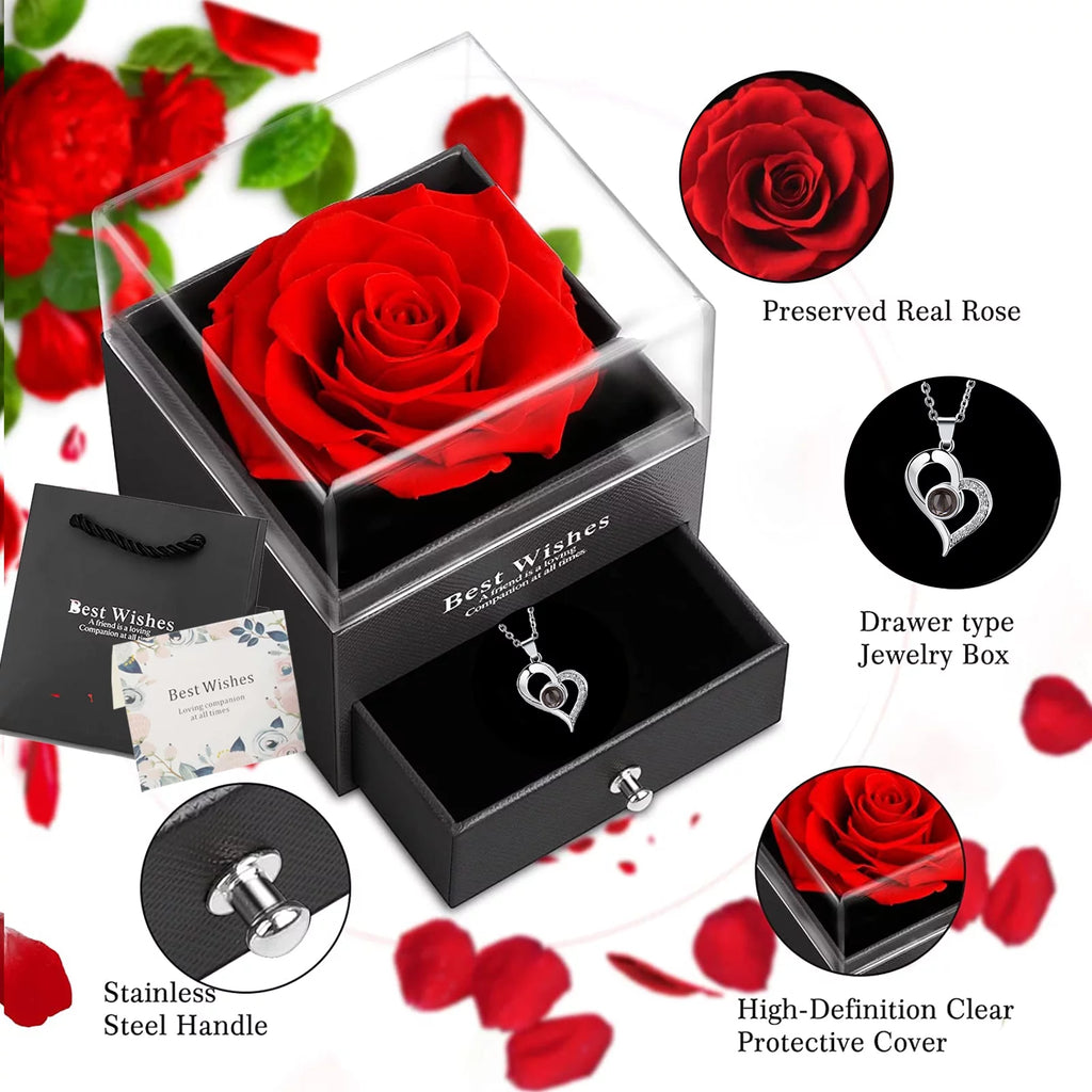 Open drawer jewelry box with preserved red rose and heart pendant necklace inside