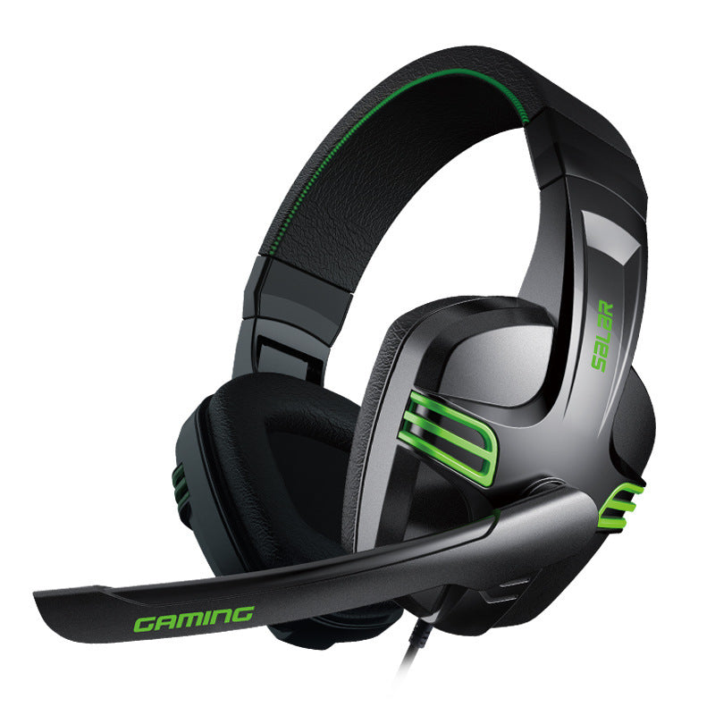 Black and gray wired gaming headset with green accents and padded ear cushions
