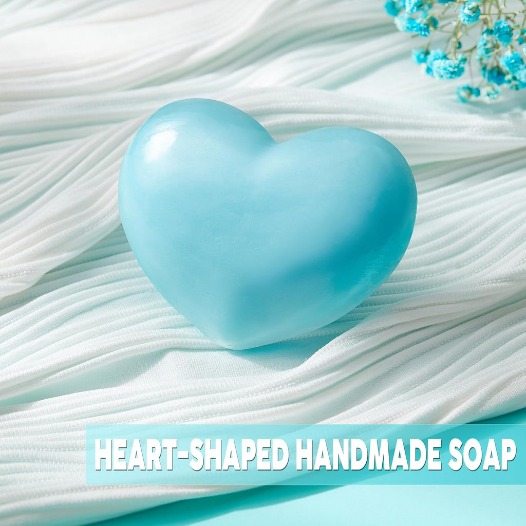 Heart-shaped handmade soap in light blue on white fabric