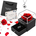 Preserved red rose in clear jewelry box with heart pendant necklace and gift bag