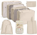 Beige travel packing cubes set with toiletries bag, zipper pouch, and drawstring bag