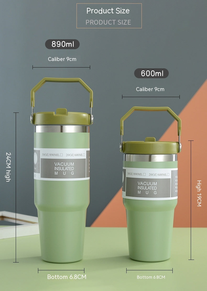 Vacuum insulated stainless steel travel tumbler with handle and lid, green