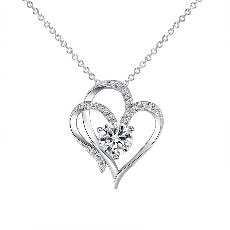 White gold heart pendant necklace with clear round stone and pavé accents