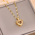 Gold-tone double-layer love heart necklace with rhinestone heart pendant, gold chain links