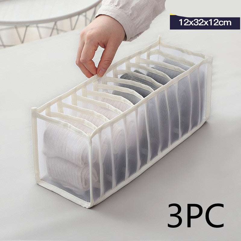 White fabric underwear drawer organizer with parallel compartments and curved divider slats