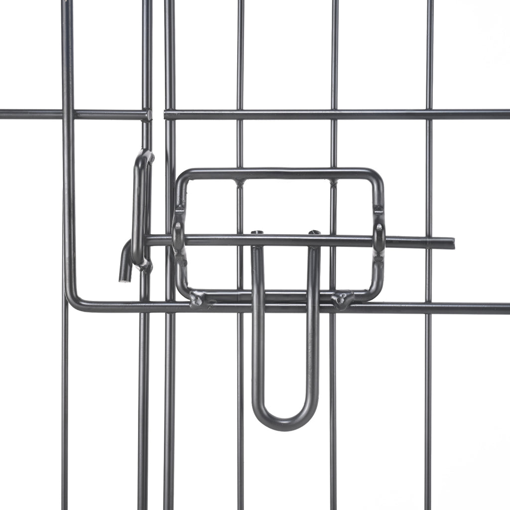 Black metal pet playpen door latch handle and wire bars, close-up
