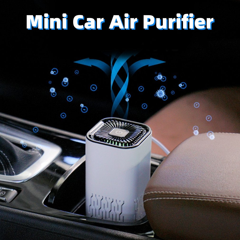 White portable air purifier with top fan grille and vented sides, on a car console.