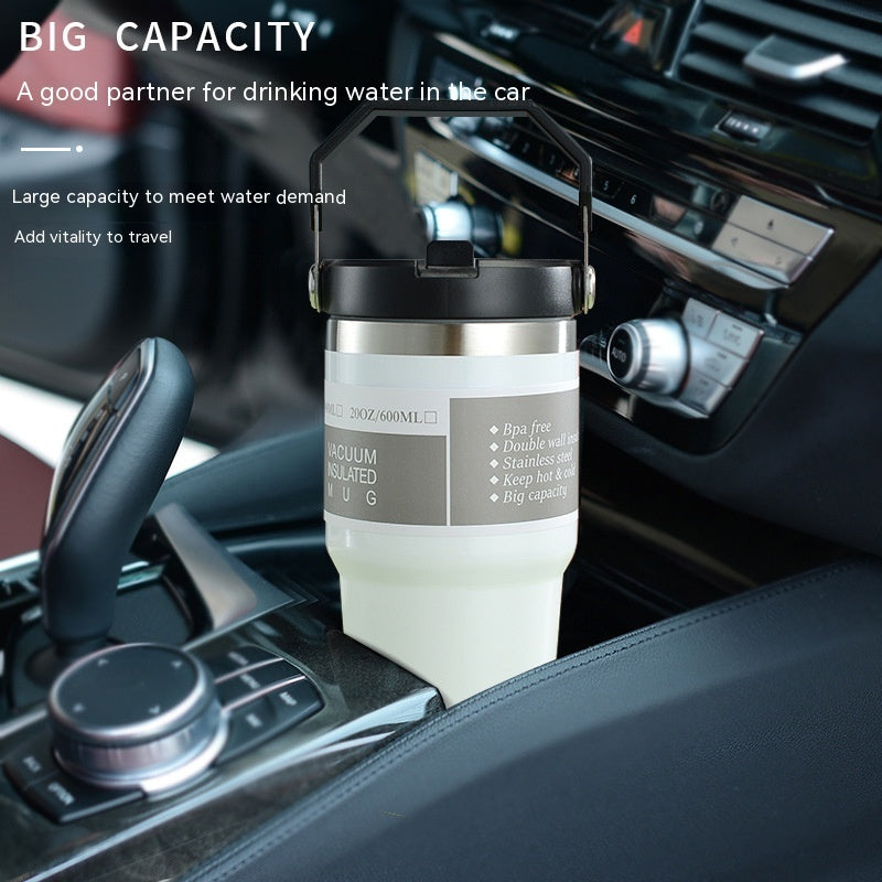 Vacuum insulated stainless steel travel tumbler with handle and lid, white