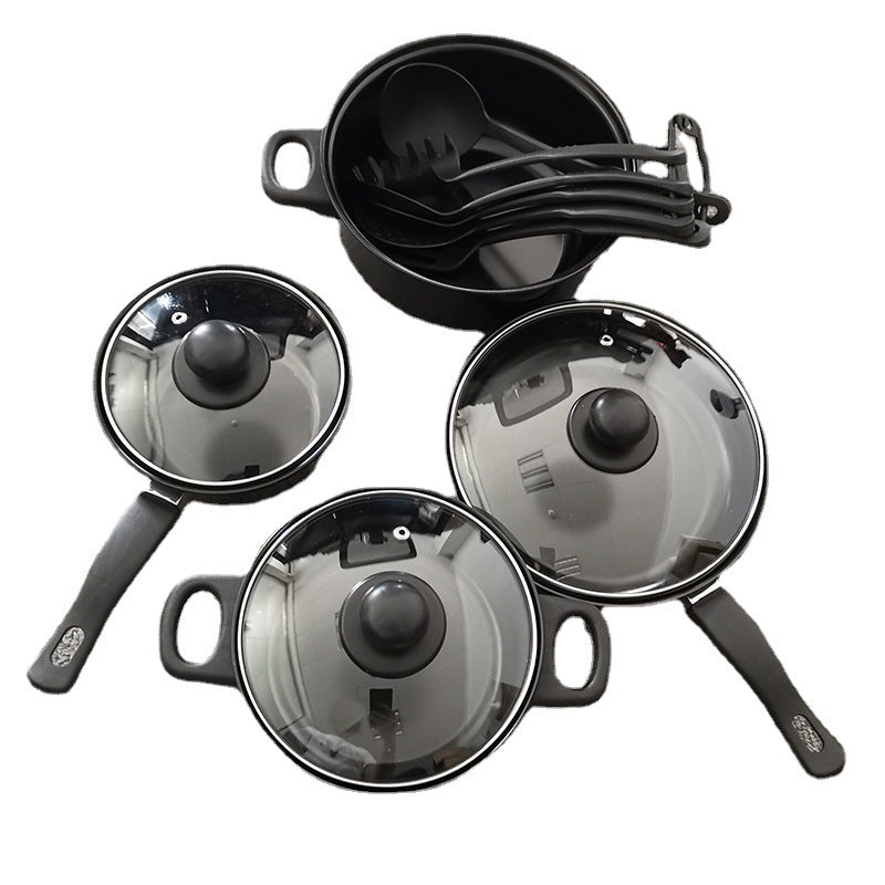 Black nonstick cookware set with three covered pots and saucepans with utensils